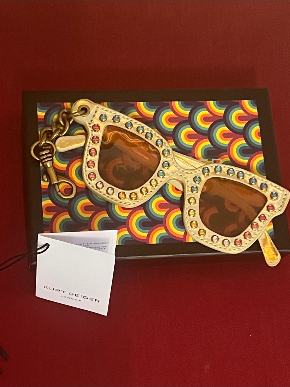 Kurt Geiger gold-tone studded sunglasses bag charm
